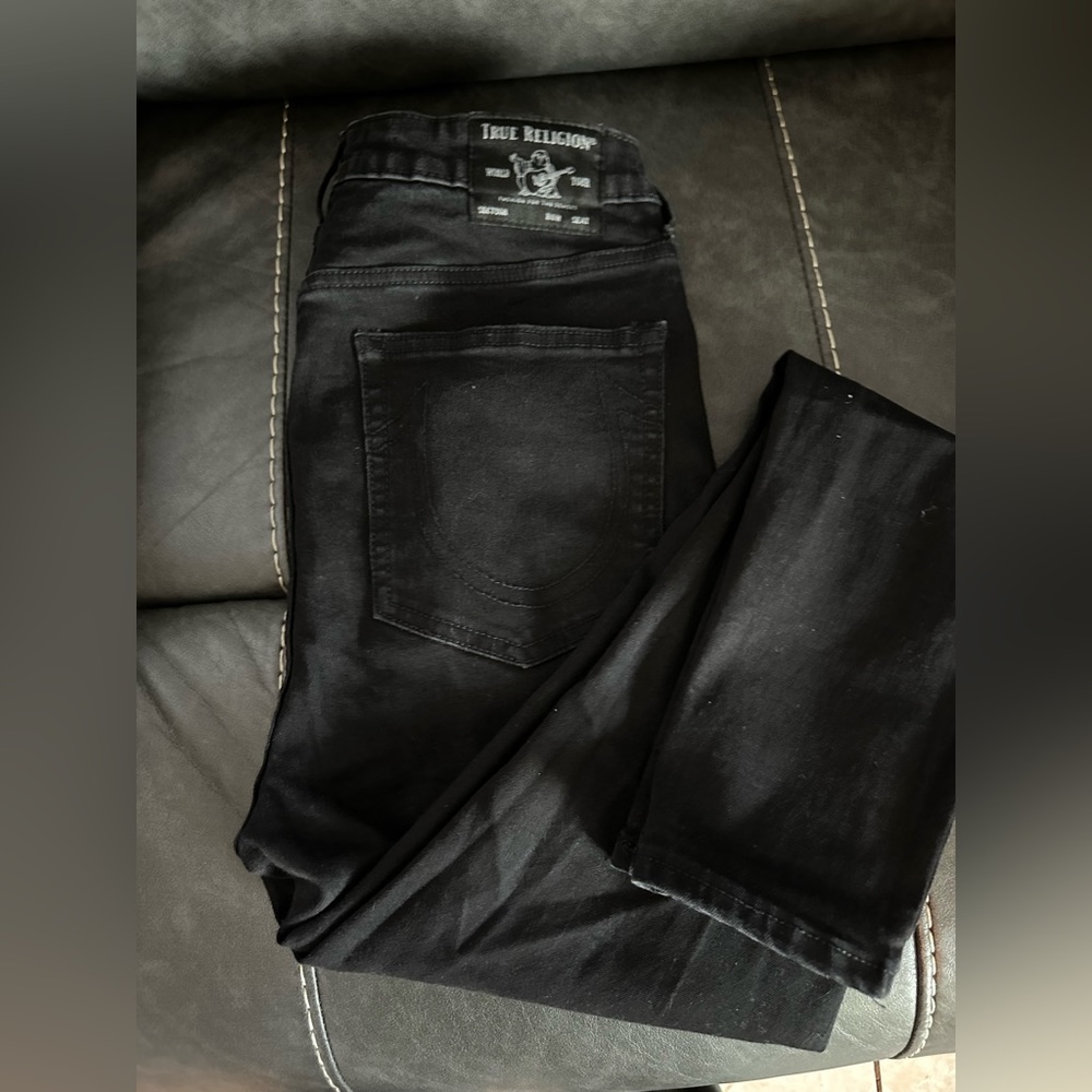 Never worn True Religion jeans in size 30.